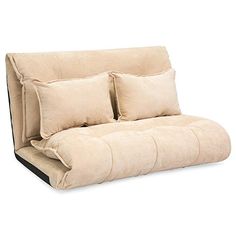 a couch that has pillows on it