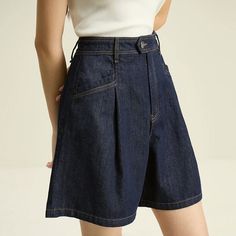 Upgrade Your Summer Style with Dark Denim Blue High Waist Loose Shorts Elevate your summer wardrobe with our newest arrival – the Dark Denim Blue High Waist Loose Shorts. Designed with both comfort and style in mind, these shorts are perfect for the modern woman who craves effortless elegance. Product Features: Retro Pleated Design: Adds a touch of vintage charm to your look. High Waist Fit: Flatters your figure and accentuates your curves. Loose Cut: Provides ultimate comfort for all-day wear. Button Fly Closure: Ensures a secure fit without sacrificing style. Durable Denim Fabric: Made with a blend of cotton, polyester, and regenerated cellulose for long-lasting quality. Benefits: Effortless Style: Transition seamlessly from casual outings to more formal occasions. All-Day Comfort: Stay Pleated Denim Shorts, Paris Vibe, Denim Clothes, Formal Shorts, Retro Shorts, Women Shorts, Chic Office, Pretty Clothes, Loose Shorts