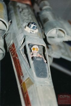 an old model star wars fighter jet is shown