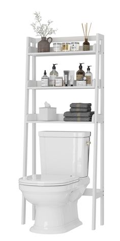 a white toilet sitting next to a shelf filled with items