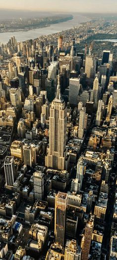 an aerial view of new york city with skyscrapers