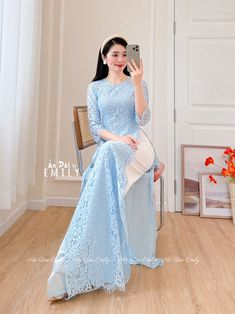 🌻Material: Lace and silk , double layers Stretchy level: 1/10 🌻 The measurement of this ao dai (long dress) is in Vietnamese size (American size tends to be bigger for the same size). Please LOOK AT THE SIZE CHART CAREFULLY BEFORE ORDERING. There might have some chalk writings on the fabric due to making process. These marks can be washed away easily. 🌻🌻No returns or exchanges Buyer can contact seller about any issues with an order. 🌸 Follow us Facebook/aodaiemily www.aodaiemily.com 💜 Than Spring Ceremony Long Sleeve Ao Dai, Spring Ceremony Ao Dai With Long Sleeves, Elegant Blue Ao Dai For Formal Occasions, Blue Maxi Dress For Wedding, Blue Wedding Maxi Dress, Fitted Long Light Blue Dress, Floor-length Ao Dai For Ceremonies, Spring Ceremony Fitted Ao Dai, Blue Long Dress For Wedding