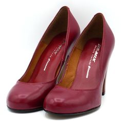 A classic early 1950’s stye pump with a “New Look” rounded toe. Leather uppers with leather soles; "croc" version made from embossed imitation crocodile with leather lining Whole and half sizes, 5 ½ - 11 3 ¼" heel Imported Sizing Runs long. Most people order a half size down. Red Leather Office Heels, Classic Red Leather Heels, Red Classic Leather Heels, Retro Leather Heels With 4-inch Heel, Vintage Brown Retro Closed-toe Heels, 1950’s Style, Shoe Repair, Shoe Company, Salvatore Ferragamo Flats