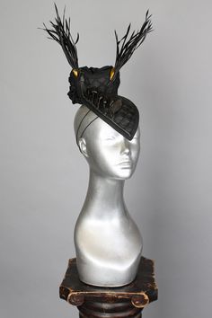 This is a one of a kind piece of wearable art made for the Five and Diamond Seventh Annual Headgear Art Show and shown on August 2, 2019. The 'venado' cocktail hat is a one-of-a-kind headpiece which will effortlessly carry you through your adventures in time and space. The arapaima fish leather has been hand-moulded with steam and water on a wooden hat form, and then hand-stitched. Designed by Jasmin Zorlu Millinery One of a kind Unisex MATERIALS USEDArapaima vegetable tanned fish leather from B Structured Crown Headpiece For Royal Ascot, Avant-garde Headpiece With Structured Crown For Party, Handmade Costume Hat With Structured Crown For Party, Handmade Fitted High Crown Mini Hats, Luxury Adjustable Headpieces For Parties, Handmade Fitted Mini Hat With High Crown, Unique Black Adjustable Costume Hats And Headpieces, Unique Adjustable Black Costume Hats And Headpieces, Handmade High Crown Top Hat For Party