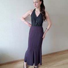 Vintage, assumingly 80s or 90s monochrome deep purple long skirt in good condition. Mermaid cut. Fitted on waist and hips, flowy ruffled bottom part.  Zips up from the side  Lightweight fabric, requires minimal ironing. Soft and comfortable on skin. Non see through, has a soft lining. Matte finish. 100% polyester Size on tag 36-38 (S-M) Measurements laid flat- Lenght 95 cm/ 37.4'' Waist 35 cm/ 13.7'' Hips 45 cm/ 17.7'' My height is 170 cm / 5"7 Chic Fitted Purple Maxi Skirt, Elegant Fitted Purple Maxi Skirt, Elegant Purple Maxi Skirt, Elegant Ruffled Purple Bottoms, Elegant Purple Ruffled Bottoms, Purple Long Skirt With Ruffles, Fitted Purple Lined Maxi Skirt, Fitted Purple Flared Maxi Skirt, Purple Long Skirt