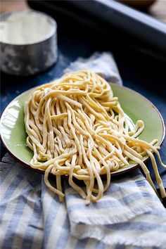 a plate full of noodles on a table