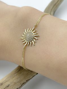 Mini Sun Bracelet, 14K Gold Bracelet, Celestial, Gift for Her, Real Gold Jewelry, Stacking Bracelet, Dainty Chain, Charm Bracelet,  ✪ Handmade / Handcrafted Fine Jewelry  ✪ Gold Weight: Approx. 1.92 g  ✪ Metal:  14K Solid Gold   ✪ Gold Color: White gold, Rose gold, Yellow gold ♡ For questions or special designs, please contact us via message. We are happy to hear from our customers and always respond quickly. Comments are always valuable. 🎁 TRANSPORTATION You can put your choice in the cart, it will be in stock and shipped within 24 hours! . Deliveries are made within 3-5 days. We are not responsible for customs duties incurred during international orders. ☎ Please leave your phone number at the checkout for shipment purposes. 🌎 RETURN POLICY Satisfaction guaranteed! No Hassle, Full refu Gold Sun Bracelet, Adjustable 14k Yellow Gold Diamond Bracelet, Adjustable Yellow Gold Diamond Bracelet In Sterling Silver, Gold Sterling Silver Round Tennis Bracelet, Gold Sterling Silver Tennis Bracelet, Gold Sterling Silver Tennis Bracelet Fine Jewelry, Yellow Gold Sterling Silver Bracelet, Gold Sterling Silver Diamond Bracelet With Polished Finish, Adjustable 14k Gold Bracelet Hallmarked