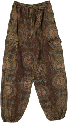 A pair of tropical bohemian handmade hippie print balloon style harem pants in one color.  These pants feature a mesmerizing hippie-inspired print and style that channels the free-spirited vibes of the 60s and 70s. #tlb #SplitSkirtsPants #bohemianfashion #Handmade #hippieharempants Diy Boho Pants, Summer Cotton Printed Harem Pants, Summer Brown Harem Pants With Loosely Fitted Hips, Loosely Fitted Brown Harem Pants For Summer, Bohemian Brown Pants With Pockets, Bohemian Summer Harem Pants With Pockets, Printed Bohemian Harem Pants For Spring, Hippie Style Brown Bottoms For Festival, Brown Hippie Bottoms For Festival