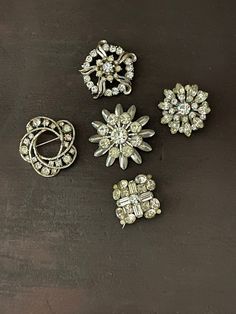 "Vintage mid century brooch collection. Silver color and rhinestones. Very nice quality. All look to be from the 1940-50s. No stones are missing, some might be a little discolored. The look great for a classic vintage look. Perfect for crafts, or vintage clothing accessories. This would make a nice gift/ for yourself or someone special. The closures all work. Aprox 1.5\" -2\" diameter." Vintage Rhinestone Brooches For Vintage Events, Vintage Anniversary Brooch With Sparkling Stones, Vintage Silver Brooches With Sparkling Stones, Vintage Multi-stone Brooches For Formal Occasions, Vintage Gold-tone Jewelry Brooch, Mid Century Fashion, Vintage Rhinestone Brooch, Fabulous Jewelry, Vintage Pins