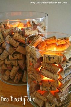 two glass bowls filled with wine corks next to each other