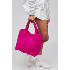 Woman wearing Fuchsia Sol and Selene Sky's The Limit - Medium Tote 841764107815 View 1 | Fuchsia Pink Shoulder Bag With Dust Bag For Travel, Pink Crossbody Bucket Bag For Travel, Pink Double Handle Bucket Bag For Travel, Pink Travel Bucket Bag, Trendy Pink Square Bucket Bag, Pink Square Shoulder Bag With Dust Bag, Pink Satchel For Everyday, Pink Travel Tote Bucket Bag, Pink Tote-style Bucket Bag For Travel