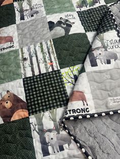 This darling 35"x40" handmade baby quilt is just the finishing touch to your Woodland Theme Nursery Decor! A great baby shower gift. I added luxuriously soft Shannon designer minky backing, Warm Company batting, then quilted the three layers, and added a double fold binding for an heirloom quality quilt.  Perfect for your precious little one to snuggle with or playtime on the floor. They are made with attention to detail & craftsmanship & to Love, Use, & Wash over & over! They get softer with every wash!  💜💜This is patchwork PRINTED on one piece of fabric digitally designed by Gingerlous - NOT individually sewn together blocks of fabric. 💜💜 💜Machine Quilted  💜100% Premium Cotton Front 💜Shannon Designer Minky Backing 💜Warm Company Batting  💜Machine Wash Cold/Tumble Dry/Low 💜No Fab Woodland Nursery Quilt, Buffalo Plaid Quilt, Animal Baby Quilt, Woodland Quilt, Nursery Quilt, Woodland Nursery Theme, Theme Nursery, Handmade Baby Quilts, Baby Boy Quilts