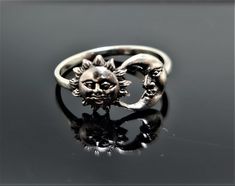 Sun Moon Ring Pure 925 Sterling Silver Sun Moon Symbol Ring Please allow 2-3 weeks shipping as we are in Bangkok Thailand at this time. We are a Los Angeles based company operating out of Thailand so that we may bring you the highest quality items at the most competitive prices. Just search and compare. We only offer authentic items. What we describe in our listings is 100% accurate and we encourage all of our customers to authenticate their purchases. USA please allow 14-21 business days Europe Adjustable Celestial Engraved Jewelry, Silver Sun And Moon Design Jewelry For Anniversary, Silver Jewelry With Sun And Moon Design For Anniversary, Symbolic Silver Jewelry With Sun And Moon Design, Symbolic Nickel-free Crescent Jewelry, Adjustable Ring With Sun And Moon Design, Adjustable Jewelry With Sun And Moon Design For Gift, Adjustable Sun And Moon Design Rings, Adjustable Sun And Moon Design Jewelry For Gifts