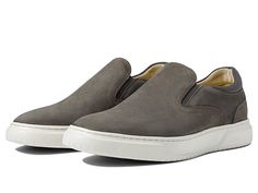 Florsheim Premier Plain Toe Slip-On Sneaker - Men's Shoes : Gray Nubuck : Ace the semi-formal look by wearing the Florsheim Premier Plain Toe Slip-On Sneakers. Leather upper. Man-made lining and removable insole. Fully cushioned Comfortech footbed with molded EVA for all-day comfort. Slide-in style. Elasticized gore for a snug fit. Round toe. Man-made outsole with high traction and durability. Imported. Measurements: Weight: 11 oz Product measurements were taken using size 9, width M (D). Please Gray Leather Low-top Slip-ons, Casual Slip-on Sneakers With Leather Footbed, Gray Leather Slip-ons With Rubber Sole, Gray Leather Slip-ons Comfortable Style, Casual Business Sneakers With Removable Insole, Gray Slip-ons With Cushioned Footbed, Slip-on Casual Sneakers For Work, Casual Low-top Slip-ons For Business Casual, Casual Slip-ons With Ortholite Insole For Work