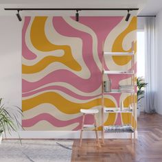 an abstract wall mural in a living room