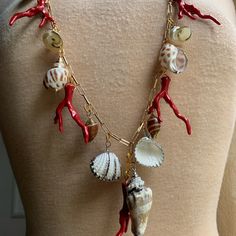 Boho Vaca Vibes Sweet Olive Necklace Of Natural Shells In Creams, Beige & Simulated Coral Charms On 18k Gold Plate Paperclip Chain. Necklace Measures 34”. Sweet Olive Jewelry Pouch. Olive Necklace, Olive Jewelry, Gold Shell-shaped Charm Necklaces With Lobster Clasp, Adjustable Bohemian Shell-shaped Necklace, Adjustable Ocean-inspired Shell Necklace With Lobster Clasp, Bohemian Multicolor Shell-shaped Jewelry, Paperclip Chain Necklace, Bohemian Shell-shaped Necklace With Lobster Clasp, Jewelry Pouch