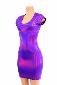 "This item is made to order, please read all the way through the listing before purchasing! This dress is made of a grape purple holographic spandex, with AMAZING shine! The deep purple reflects liquid fuchsia rainbows all over your curves, accentuating every move you make! It features a scoop neckline and cap sleeves. It is made of four way stretch lycra spandex, and it fits like a glove! Super figure flaunting and fun! LENGTH: 27\" (from the underarm to the hemline) Womens Sizing (See below fo Purple Fitted Bodycon Dress With Short Sleeves, Purple Fitted Short Sleeve Bodycon Dress, Iridescent Fitted Mini Dress, Purple Fitted Short Sleeve Dress, Fitted Purple Mini Dress With Short Sleeves, Shiny Fitted Mini Bodycon Dress, Purple Bodycon Dress For Club, Purple Stretch Bodycon Dress For Night Out, Purple Fitted Bodycon Dress For Club