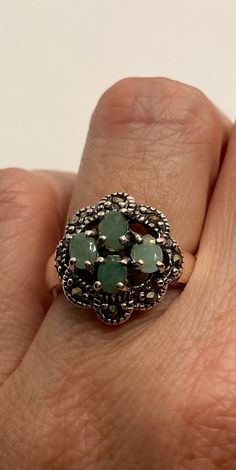 Vintage genuine emerald ring rich and very bright green Emerald. Sterling silver setting with marcasite details. Size 5.5 or 6.5 can be sized by my jeweler. His service charge is $10-$20 All rings are shipped in a nice gift box. Check out our over a THOUSAND great reviews Engraving is $4 per letter and is not always perfect depending on the piece. It can take a few days if the jeweler is busy. This is payable to Paypal Judithsltd@gmail.com Vintage Cocktail Ring, Emerald Ring, Emerald Green, Cocktail Rings, Rings Statement, Turquoise Ring, Vintage Rings, Emerald, Gemstone Rings