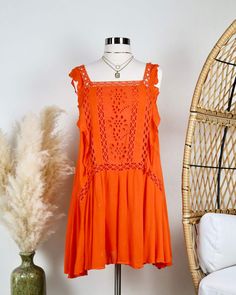 Super soft Coral is more orange like. Rayon blend Fully lined Embroidered eyelet detail Ruffle... Soft Coral, Soft Corals, Asymmetrical Hem, Ruffle Trim, Asymmetric Hem, Medium Length, Flapper Dress, Sleeveless Dress