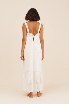 The Louisa Tie Dress is a POSSE piece you'll treasure for years to come. Cut from 100% cotton, it's detailed with intricate broderie anglaise and has stunning scalloped trims. It turns to reveal an open back with an adjustable tie feature. Vintage inspired embroidery Keyhole at centre back High-Low hem Fully lined Material: 100% OEKO-TEX 100 certified cotton Made in India Heel Accessories, Feather Dress, Style Maxi Dress, Denim Flares, Tie Dress, Denim Pant, Designer Collection, A Line Skirts, White Vintage