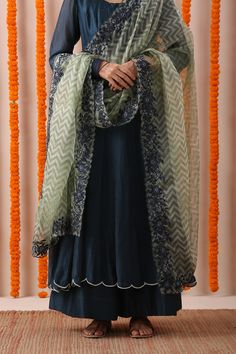 Blue anarkali with pearl embroidery and scalloped hem. Comes with palazzo and dupatta.
Component: 3
Pattern: Embroidery
Type Of Work: Pearl
Neckline: Round
Sleeve Type: Full
Fabric: Handloom Chanderi and Organza
Color: Blue
Other Details: 
Chevron print dupatta with embroidered scalloped border
Occasion: Puja - Aza Fashions Semi-stitched Organza Salwar Kameez With Embroidered Border, Floor-length Georgette Dupatta With Embroidered Border, Blue Wedding Dress With Embroidered Border, Anarkali Sets With Embroidered Border In Georgette, Anarkali Georgette Set With Embroidered Border, Semi-stitched Sharara With Embroidered Border For Reception, Eid Reception Anarkali Set With Embroidered Border, Georgette Anarkali Set With Embroidered Border And Straight Kurta, Georgette Anarkali Set With Embroidered Border