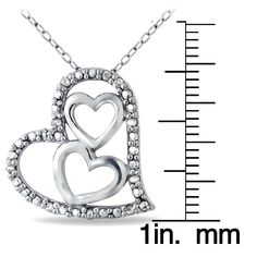 This lovely necklace showcases two polished hearts within a heart. The border features ten genuine diamonds set in the midst of a dotted pave design which gives a sparkling effect. The pendant dangles from an 18-inch rolo chain and is secured by a spring ring clasp. Pendant and chain are crafted of sterling silver. Total diamond weight: .10ct. Product Details Metal Type sterling-silver Metal Stamp 925-sterling Weight 3.5GR Length 18IN Width 17MM Height 18.4MM Clasp Type spring-ring Chain Type ro Triple Heart, Lovely Necklace, Rolo Chain, Chain Ring, Metal Stamping, Spring Rings, A Heart, Heart Necklace, Washer Necklace