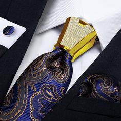 Achieve a sophisticated and tailored look with our luxurious Gold Paisley Blue Silk Ties for Men With Plastic Buckle. Crafted with signature DiBanGu designer detail, silk of the finest quality is fashioned into a classic and timeless shape, complete with matching pocket square and cufflinks. Featuring a one size 59.06''(150cm) length and 3.35''(8.5cm) width. Make a bold statement with this exquisite piece. SPECIFICATIONS Ties Type: Neck Tie Set Tie Size: One size 59.06''(150cm) length and 3.35'' Gold Paisley, Ties For Men, Designer Ties, Unique Ties, Wedding Accessory, Fathers Day Sale, Cufflink Set, Silver Jewellery Sets, Cufflinks Wedding