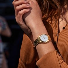 This classic Eco-Drive Sport women's watch from Citizen showcases shimmering diamond indexes, a date window at 3 o'clock and high-contrast white mother-of-pearl dial with luminescent hands for essential information at a glance. A sapphire crystal tops the 33mm yellow gold stainless steel case while a fold-over clasp secures the yellow gold steel bracelet. The women's watch features an Eco-Drive movement powered by any light, so it never needs a battery. Womens Designer Watches, Eco Drive Watches, Citizen Eco, Peoples Jewellers, Eco Drive, Women's Watch, Stainless Steel Watch, O Clock, Luxury Women