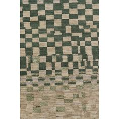 a green and beige rug with squares on the side, in different sizes and colors