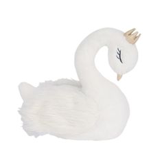 a white swan with a golden crown on its head