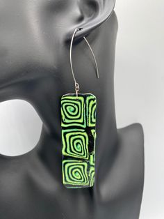 Combination of green, yellow, and black swirls polymer clay earrings   Slight variants or imperfections may differ in color and details due to the nature of handcrafting.   Polymer Clay Length: 4.5" Width: 1"  Hypoallergenic posts Silver hook Wipe Clean Made in USA Handmade  Warning Choking Hazards Jewelry Clay, Clay Dangle Earrings, Multicolor Earrings, Earrings Big, Color Earrings, Earrings Polymer Clay, Big Earrings, Earrings Statement, Earrings Jewelry