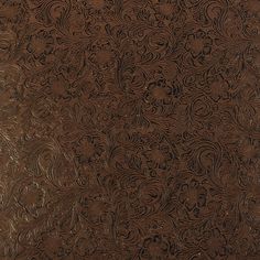 an intricately designed brown leather background