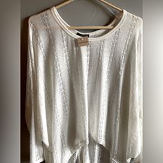 Straight From Apricot Lane, An Off White Sheer Long Sleeve Sweater With Button Detail On The Back. Lightweight Long Sleeve Tops For Spring, White Lightweight Top For Spring, Lightweight White Top For Spring, Casual Lightweight Spring Tops, Trendy White One Size Tops, White One Size Tops For Fall, One Size White Tops For Fall, Ralph Lauren Sweater Women, Yellow Cable Knit Sweater