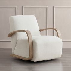 a white chair sitting on top of a hard wood floor