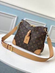 Description L.V Odéon PM Monogram Canvas Natural For Fall-Winter,  Shoulder And CrossBody Bags 11in/28cm LV M45354 Rep 1:1 For Fall-Winter 2020, L.V introduces the new Odéon PM, a stylish and functional shoulder bag. Made from Monogram canvas, this new zipped besace evokes the House’s heritage with its natural name tag and reinforced corners. A surprisingly roomy interior make it practical while an adjustable leather strap allows comfortable shoulder or crossbody wear. 28 x 25 x 9 cm / 11 x 9.8 x 3.5 inches (Length x height x width) Natural Monogram coated canvas Textile lining Gold-color hardware Double zip closure Outside flat pocket with magnetic closure Inside flat pocket Strap:Removable, adjustable –  Includes dust bag. –  This product is of the best quality. Crossbody Louis Vuitton, Louis Vuitton Odeon, Pm Monogram, Louis Vuitton Crossbody, Practical Bag, Big Bag, Sierra Leone, Monogram Canvas, Natural Leather