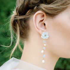 Dream of feather-light blooms and a warm summer breeze. These flower earrings are made with small gold beads and real hydrangea petals. These delicate hydrangea flower petals are layered on a silver post (with pushback) with golden embellishment in the center. Small freshwater pearls and light blue beads hang delicately on a matching gold chain. /All the flowers have been properly dehydrated before being coated/cast in resin so that the color stays fresh-looking for seasons/ Hydrangea Petals, Real Flower Jewelry, Acrylic Flowers, Hydrangea Flower, Feather Light, Summer Breeze, Bracelet Clasps, How To Preserve Flowers, Flower Jewellery