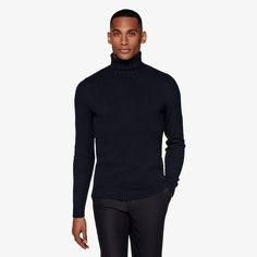 A versatile shade meets a classic winter style in this luxurious navy turtlneck sweater-wear it on its own or pair it with a jacket for a casually refined take on seasonal styling. Navy Polo Sweater For Winter Workwear, Navy Fitted Sweater For Fall, Formal Merino Wool Sweater For Winter, Winter Merino Wool Turtleneck For Workwear, Classic Navy Polo Sweater For Fall, Merino Wool Turtleneck For Winter Workwear, Navy Fitted Sweater For Winter, Formal Wool Turtleneck Sweater, Modern Winter Turtleneck For Workwear