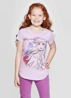 Help your girl show off her love for Anna with this girls' Disney Anna Destiny Awaits Short-Sleeve T-Shirt. Crafted from a lightweight fabric for cool comfort, this short-sleeve graphic tee features a lined illustration of Anna surrounded by watercolor-style detailing in hues of violet and pink — printed text reads “Destiny Awaits,” completing the magical vibe. A great addition to your girl's casualwear wardrobe, she'll love pairing this purple graphic T-shirt with a variety of bottoms and Froze Girls Disney, One Piece Clothing, Sequin Shorts, Cozy Pullover, Black Cat Halloween, Girls Show, Swimwear Cover Ups, Disney Girls, Swimwear Cover