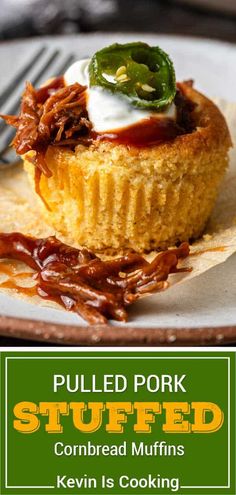 pulled pork stuffed cornbread muffins on a white plate