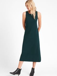 Green Relaxed Fit Midi Dress For Work, Casual Green Dress With Straight Neckline, Casual Workwear Dress With Straight Neckline, Fit And Flare Sleeveless Fall Dress, Sleeveless Green Midi Dress For Fall, Green Sleeveless Dress For Fall, Chic Green Relaxed Fit Dress, A-line Dresses With Relaxed Fit For Work, A-line Stretch Maxi Dress For Work