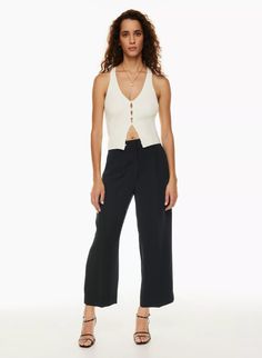 THE EFFORTLESS CROPPED PANT | Aritzia Chic Suits For Women, Effortless Pant, Black Work Pants, Melina Pant, Crepe Trousers, Paper Bag Waist Pants, What To Wear To Work, Knife Pleats, Corner Office