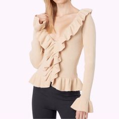 Revamp Your Wardrobe By Adding The Wayf Flutter Ruffle Ribbed Cardigan, Perfect To Spruce Up Your Everyday Look. V-Neckline. Long Sleeves With Ruffled Cuffs. Centre Front Toggle Closure Featuring Pearl Buttons. Ruffled Hemline. 50% Viscose, 27% Polyester, 23% Nylon. New With Tags Approx Measurements: 15” Pit To Pit 23 Shoulder To Bottom Bin Dudu Soft Wool Sweater, Knot Sweater, Tie Front Sweater, Tie Sweater, Henley Sweater, Ruffle Sweater, Knitted Romper, Ribbed Cardigan, Open Knit Sweater