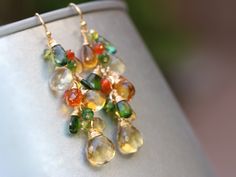 "THE JEWELRY IS SHIPPED via DHL EXPRESS (2-5 days delivery door to door). THE DHL SHIPPING COST IS INCLUDED IN THE PRICE. The Early Autumn Earrings - Multi Gemstone Earrings, Fall colors ► Measurements / Details: - Length including earwire: 2.25\" (~5.7 cm) * can be made longer/shorter per request - Gold: High quality 14K Gold Filled - Silver: High quality Sterling Silver ► Gemstones: The earrings include excellent AAA quality gemstones, they are natural, superbly faceted and vibrant: ~ Light Ci Dangle Multi-stone Earrings For Gifts, Multicolor Gemstone Accent Earrings For Wedding, Multicolor Gemstone Accented Earrings For Wedding, Multi-stone Drop Earrings For Gift, Handmade Multicolor Earrings For Anniversary, Multicolor Multi-stone Teardrop Earrings, Multicolor Teardrop Earrings With Gemstone Accents, Teardrop Multi-stone Earrings As A Gift, Multicolor Drop Jewelry With Matching Earrings