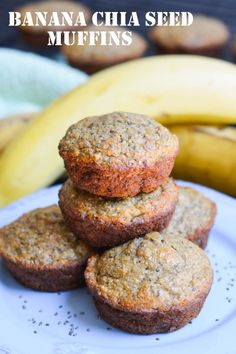 banana chia seed muffins stacked on top of each other with bananas in the background