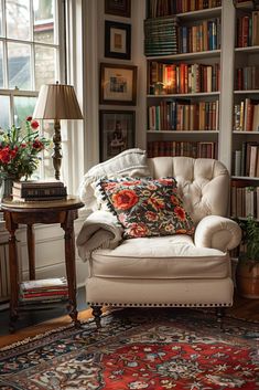 a living room filled with lots of books and furniture