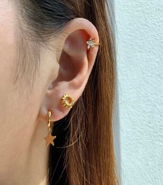 "Flower ear cuff Details - Materials * Gold plated 18 carat over 925 sterling silver * Available also in 925 sterling silver * Zirconia Stones * Nickel free * Lightweight * Sold in individually or in pairs - Measurements * Length: 14mm * Flower Diameter: 7mm ✔︎Check the other items that this model wears: https://www.etsy.com/listing/840179821/moon-hoop-earring-dainty-minimalist?ga_search_query=moon&ref=shop_items_search_2&pro=1 https://www.etsy.com/listing/795327815/two-studs-chain-earri Dainty Gold Plated Hypoallergenic Ear Cuff, Dainty Hypoallergenic Gold-plated Ear Cuff, Dainty Cubic Zirconia Ear Cuff For Everyday, Everyday Cubic Zirconia Huggie Ear Cuff, Everyday Hypoallergenic Gold Plated Ear Cuff, Dainty Cubic Zirconia Huggie Ear Cuff, Gold Plated Hypoallergenic Ear Cuff For Gift, Hypoallergenic Gold Plated Ear Cuff As A Gift, Hypoallergenic Gold Plated Ear Cuff For Gift