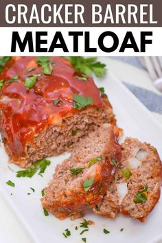 meatloaf with sauce and parsley on top is cut in half to show the meat