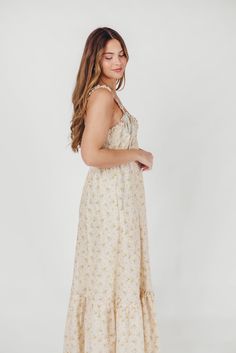 Simple but absolutely charming, the Penelope Maxi Dress is just the ticket for your next summer event. From its delicate ruffled details to its in-seam pockets and flounced skirt, the Penelope is all cottagecore elegance. Dressed up with heels or dressed down with slides or mules, this dress promises season after season of beautiful wear. Available in two colorways. FIT: Runs true to size. MATERIAL: Cotton. GARMENT DETAILS: Lightweight floral maxi dress with V-neckline, ruffled double straps, an Flounced Skirt, Garment Details, Cotton Maxi Dress, Cotton Maxi, Maxi Dress Cotton, Summer Events, Cinched Waist, Floral Maxi, Full Skirt