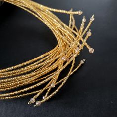 Elegant Adjustable Beaded Necklace, Elegant Adjustable Beaded Necklaces, Gold Beaded Party Jewelry, Gold Necklace With Beaded Chain For Party, Multi-strand Gold Jewelry For Celebration, Party Jewelry In Gold-tone With Gold Beads, Rose Gold Wire Wrapped Jewelry For Party, Gold Pendant Necklace For Party, Party Gold Plated Beaded Jewelry