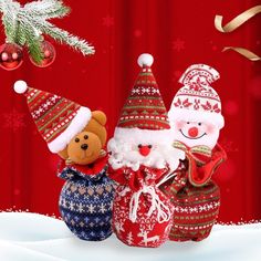 three stuffed animals dressed in christmas sweaters and hats